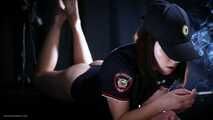 Police woman is smoking 3 strong reds in the studio