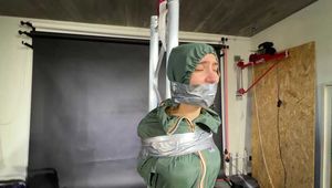 Rey Sanson broke into the wrong House getting bound and gagged in her Rainwear by to other Burglers
