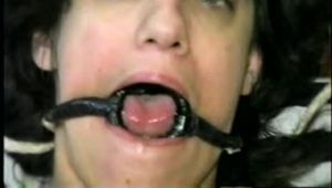 26 Yr OLD K-MART CLERK IS RING GAGGED, FROG-TIED, WEARING GARTER BELT & NYLON STOCKINGS, PLAYS AND LICKS HER TITS, PLAYS, FINGERS & USES A VIBRATOR DILDO ON HER PUSSY (D60-15)