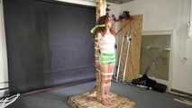 Beautifull Lola Montez tied and gagged very strictly to a post in shiny nylon Shorts