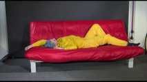 Watching Mara putting on sexy yellow shiny nylon rainwear lolling on the sofa (Video)