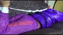 ***HOT SANDRA*** tied, gagged and hooded with ropes and a cloth gag on bed wearing a sexy purple shiny nylon down jacket and a rain pant (Video)