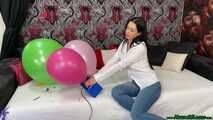 sexy preparing U16 balloons with electrical pump and popping them