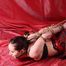 Cleavegagged barefoot Patricia, hogtied with her elbows touching and with her big toes tied to her hair tie