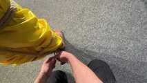 Ms Ungeniert tied, gagged and hooded in shiny nylon yellow Downjacket
