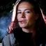 Mature woman smoking outdoors