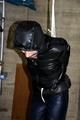 Julia tied and gagged in down jacket (cellar)