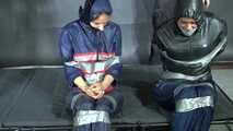 Aiyana and Ms Ungeniert bound and gagged in shiny nylon Rainwear