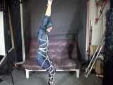 Watch Sonja enjoying Bondage in her shiny nylon Rainwear