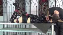 Ana in straitjacket hooded