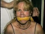 38 Yr OLD CASHIER IN BLACK LEATHER DRESS, TIED & GAGGED HOSTAGE (D22-14)