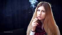 Mysterious girl Valya poses on camera with a tasty 120mm cigarette