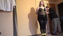 Sandra tied with yellow ropes 3/4