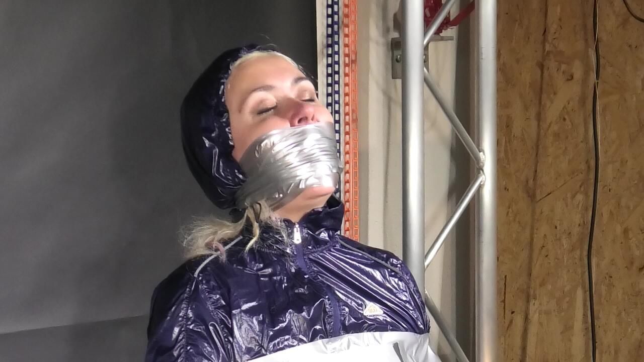 Alice Bound, Gagged And Vibed In Shiny Nylon Rainwear And She Enjoyed It!