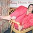 Brown-haired archive girl lolling on bed wearing a supersexy red shiny nylon rainwear combination (Pics)