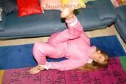 Katharina tied and gagged in shiny nylon ski suit