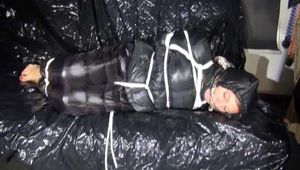 Get a Video with Sandra enjoying Bondage in her Shiny Nylon Downwear from our 2016 Archive