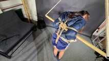 Marie bound, gagged and spanked in shiny nylon Shorts and a Windbreaker