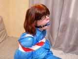 [From archive] Stella - taped to the chair in trash bag costume 03