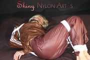 Watching sexy Sonja being tied and gagged on a bed with ropes and a clothgag wearing a supersexy shiny brown nylon pants and a brown rain jacket (Pics)