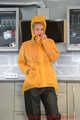 Miss Francine in different raincoats and Ilse Jacobsen rainpants with Hunter boots