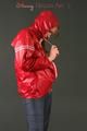 Anastasia posing in a foto studio wearing supersexy rainwear (Pics)
