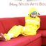 Mara tied, gagged and hooded with tape on a red sofa wearing shiny yellow rainwear (Pics)