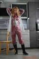 Miss Alice in Nylon rainsuit covered with transparent raingear