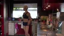 Watching sexy COURTNEY wearing a darkblue shiny nylon shorts and a top while preparing coffee and doing her housework (Video)