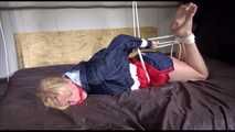 ***HOT HOT HOT*** PIA tied and gagged on a bed with ropes on the ceiling wearing sexy blue/red shiny nylon shorts and a white shirt (Video)