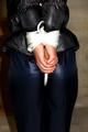 Julia tied and gagged in down jacket (cellar)