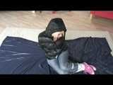 Get 2 Videos with Jessy bound and gagged in shiny nylon Downwear from 2008.