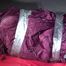 Pia being tied and gagged with tape on a sofa wearing sexy purple shiny nylon downwear (video)