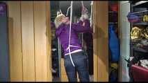 Pia tied with ropes overhead and gagged with a ballgag wearing sexy rain pants and a rain jacket (Video)