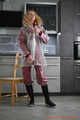 Miss Alice in Nylon rainsuit covered with transparent raingear