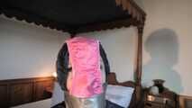 Rachel Adams bound, pantygagged and pantyhooded in shiny nylon Rainwear