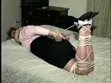 44 Yr OLD HOUSEKEEPER ON SCREEN HOG-TYING, MOUTH STUFFING, FEET AND LEG TAPE TYING WEARING PANTYHOSE, & WRAP TAPE GAGGING (D56-13)