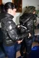 Petra was tied by Jill in shiny downjackets 