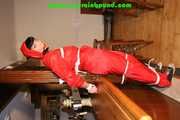 Get 548 Pictures with Jill tied and gagged in shiny nylon rainwear from 2005-2008!