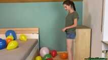 stomp2pop the balloons with her clogs shoes