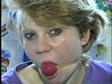 22 Yr OLD LISA IS RUBBER BAND BALL-GAGGED, MOUTH STUFFED, HANDGAGGED, OTM & CLEAVE GAGGED (D43-6)