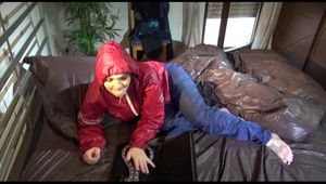 Jill tied and gagged with iron by sophie wearing sexy shiny nylon rainwear (Video)