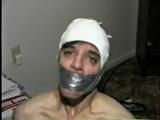 26 Yr OLD K-MART CLERK WRAP TAPE GAGGED WEARING BATHING CAP, MOUTH STUFFED. TIT TIED, CROTCH ROPED, NUDE, GARTER BELT & NYLON STOCKINGS TIGHTLY TIED TO A CHAIR (D63-13)