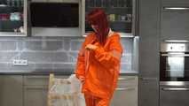  Miss Petra in AGU raingear (original AGU) and an exclusiv orange Adidas AGU raincoat layered over her raingear