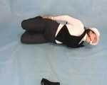 Dressed up Rozanka in a fantastic bondage session (video)