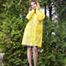 Miss Petra in sexy secretary outfit and yellow raincoat