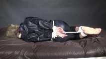 Watching Pia being tied and gagged with ropes and a clothgag wearing sex black shiny nylon suit (Video)