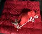 Get 3 Archive Videos with nice young women enjoying Bondage in shiny nylon Rainwear from 2008.