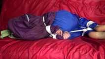 SANDRA being tied and gagged on a sofa with ropes and a clothgag wearing a sexy blue shiny nylon rain pants and a purple rain jacket  (Video)