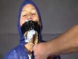 Watch Sandra beeing bound, pantygagged and finally pantyhooded in her shiny nylon Rainwear